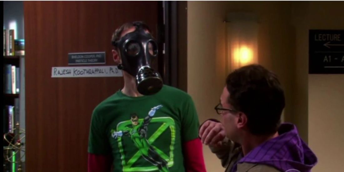 Sheldon and Raj fighting over Sheldon's office space in The Big Bang Theory with Sheldon wearing a gas mask.