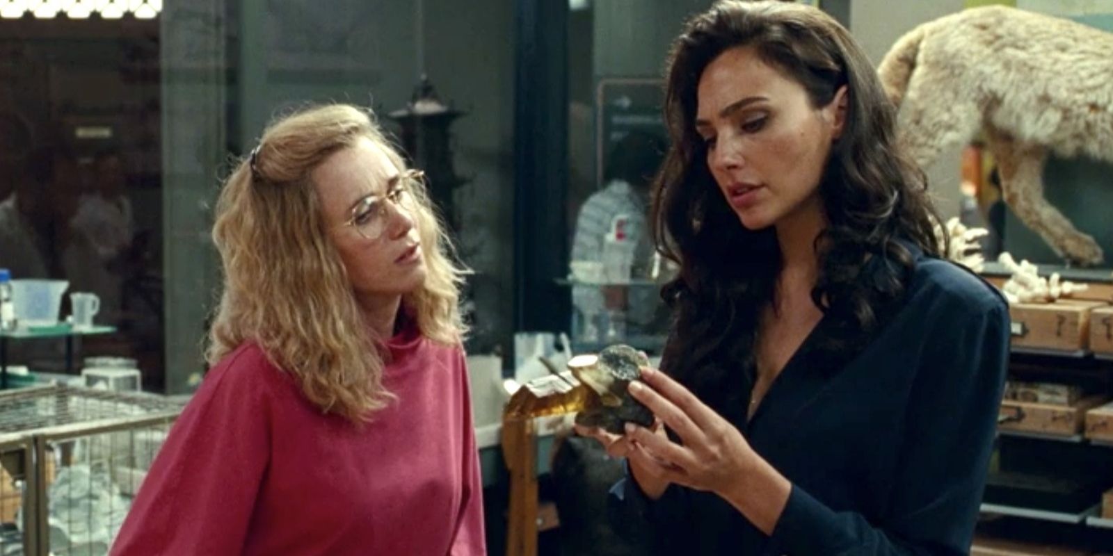 Diana Prince talks with Barbara Minerva over an artifact at the Smithsonian in Wonder Woman 1984