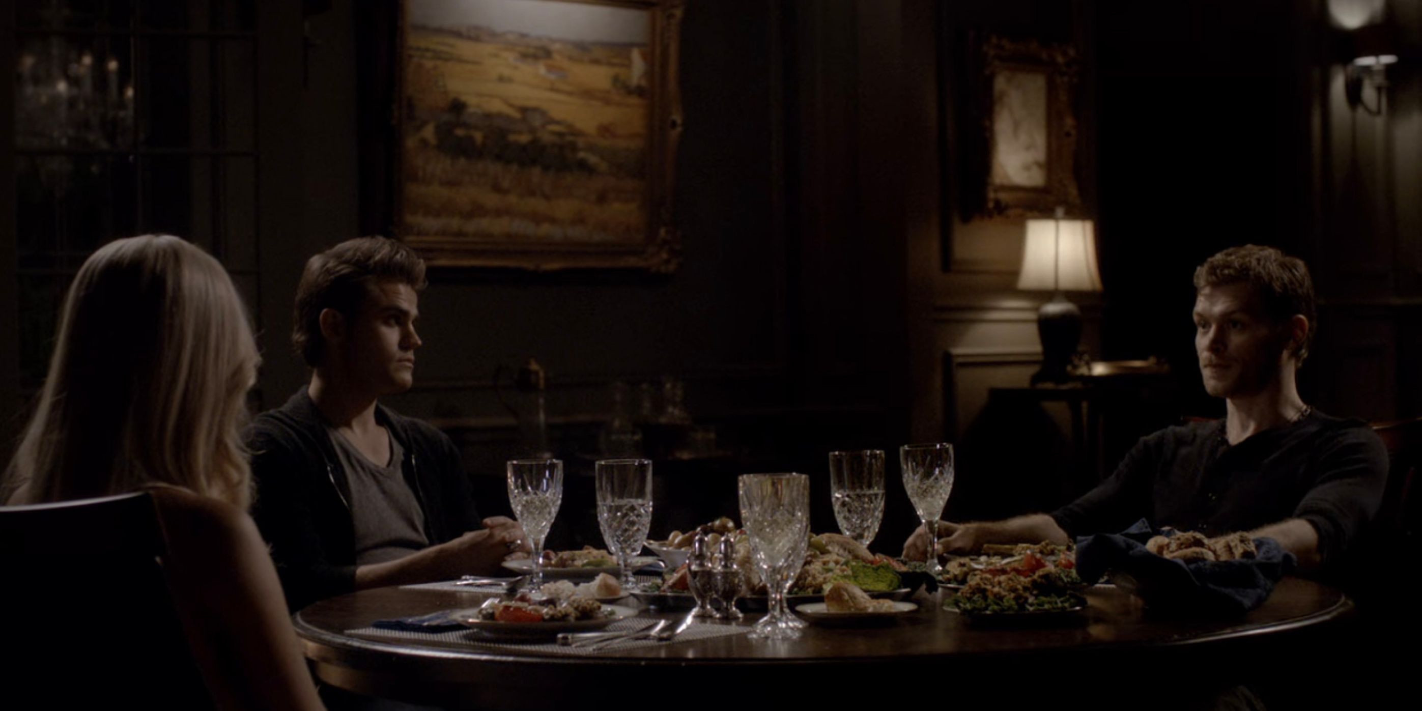Stefan attends Klaus and Rebekah's dinner party in The Vampire Diaries.