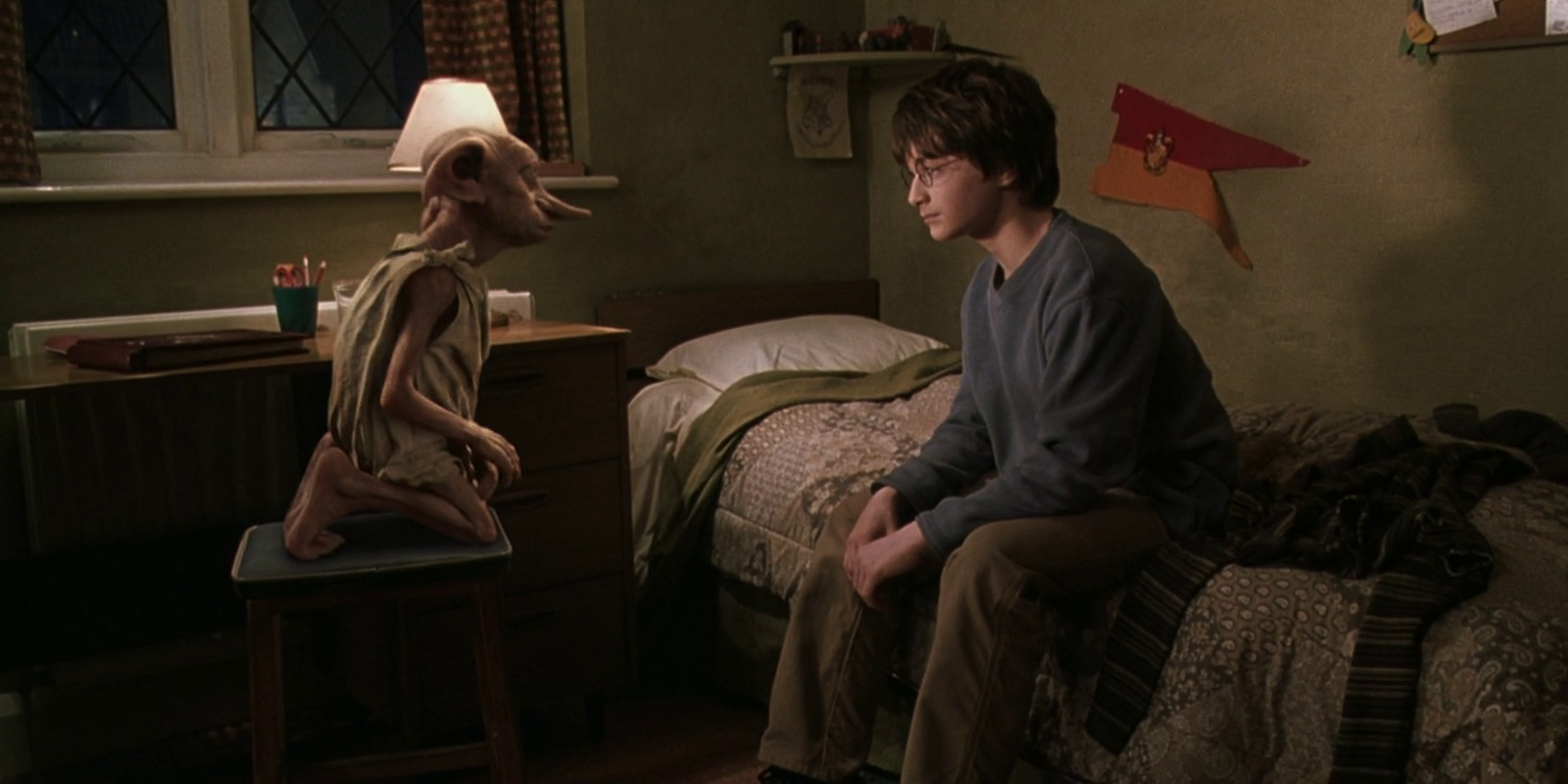 Dobby and Harry Potter arguing