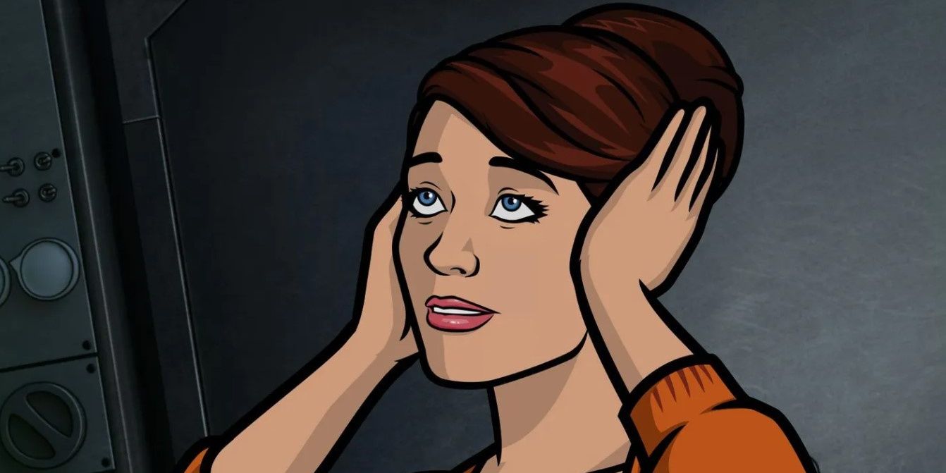 Cheryl covering her ears
