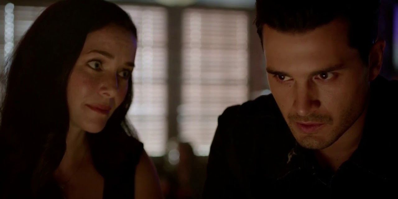 Enzo and Lily in the boarding house in The Vampire Diaries.