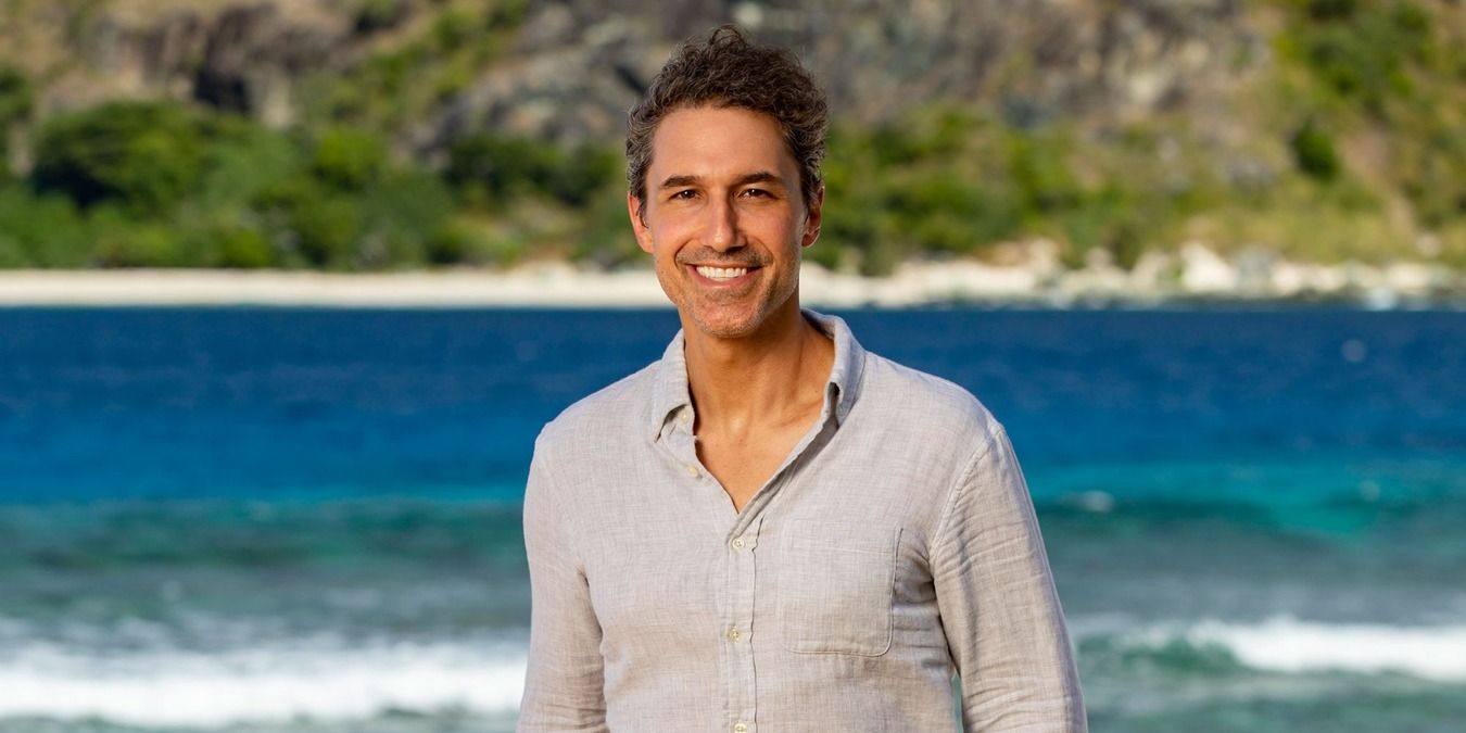 Ethan Zohn posing on the beach for Winners at War