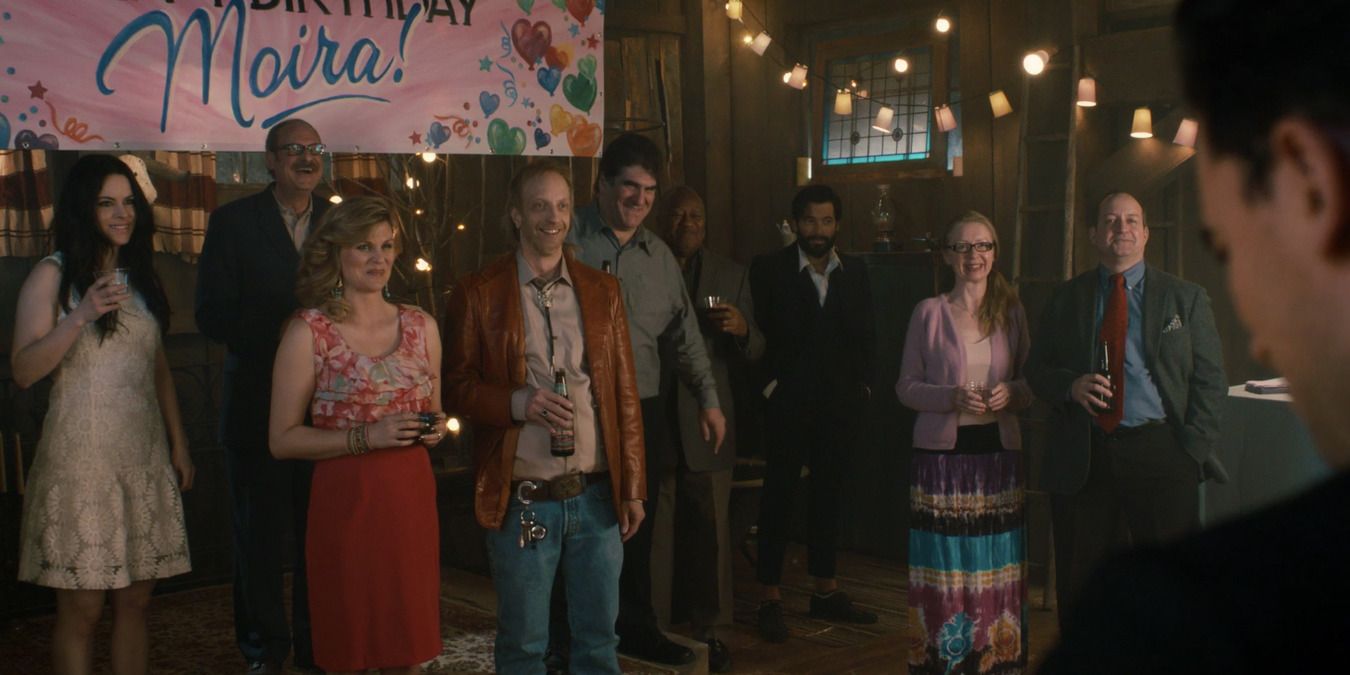 Everyone waiting for Moira in the barn for her birthday party