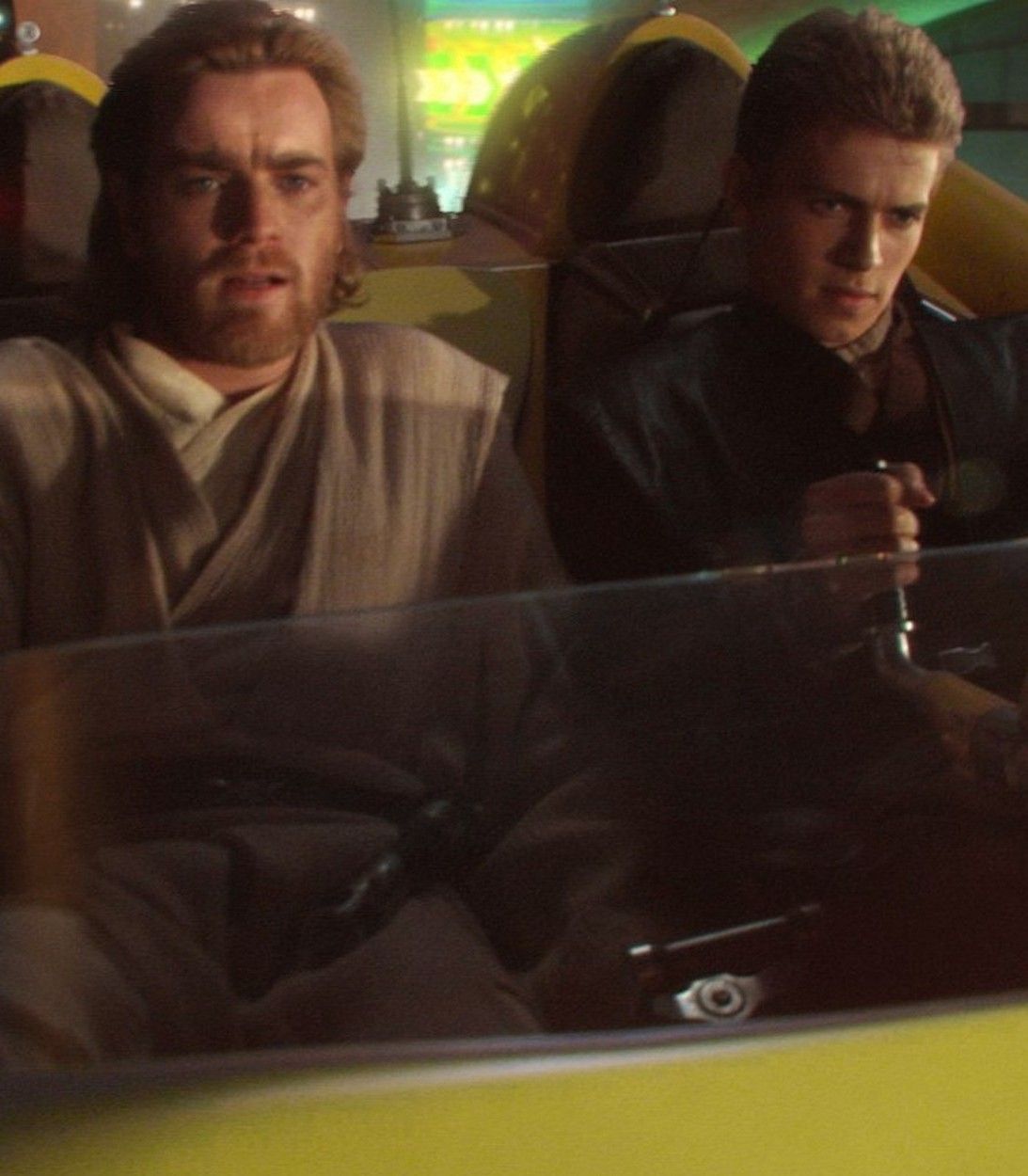 Ewan McGregor as Obi-Wan Kenobi and Hayden Christensen as Anakin Skywalker in Star Wars Attack of the Clones vertical