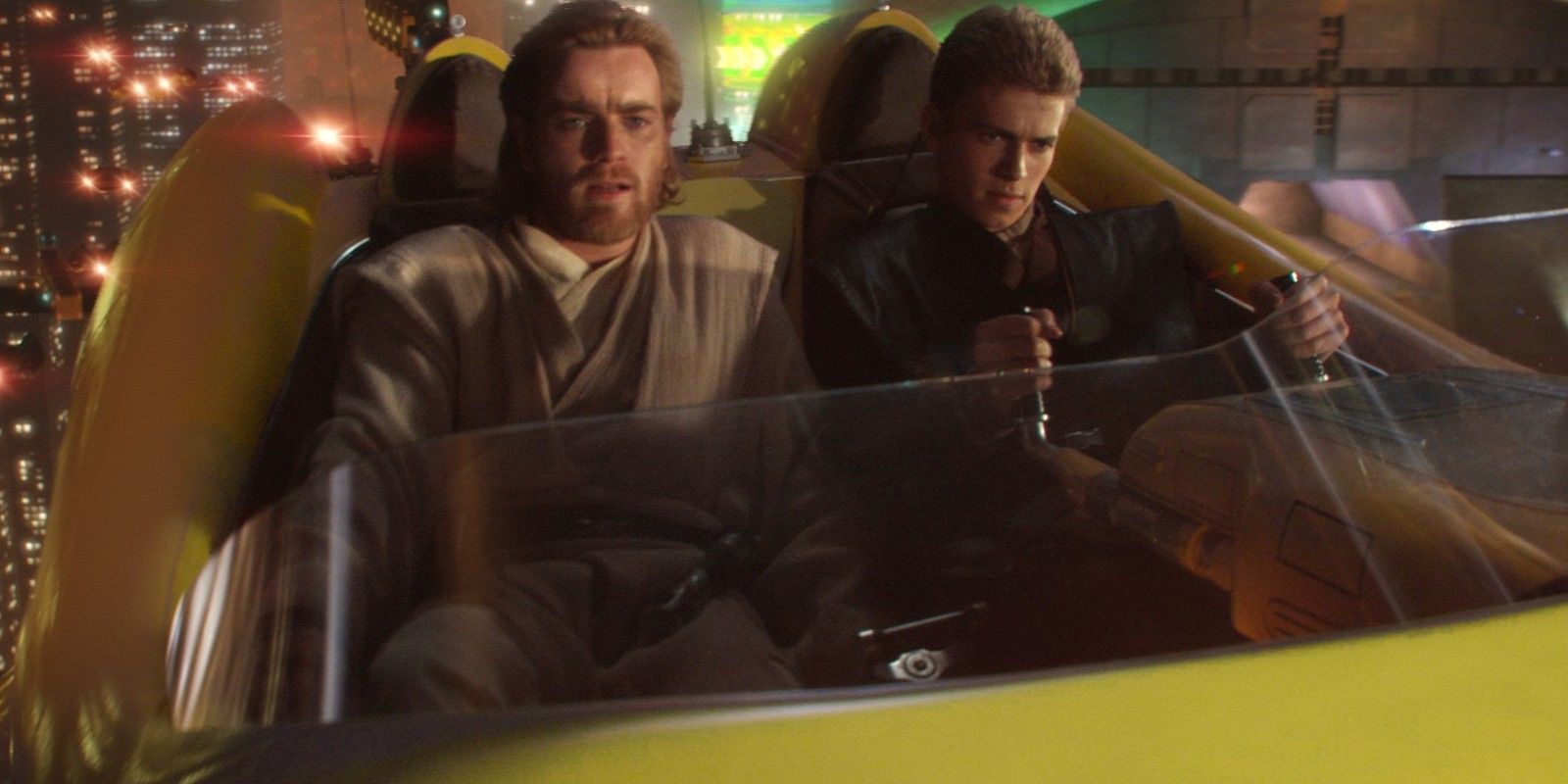 Ewan McGregor as Obi-Wan Kenobi and Hayden Christensen as Anakin Skywalker in a speeder on Coruscant in Star Wars Attack of the Clones