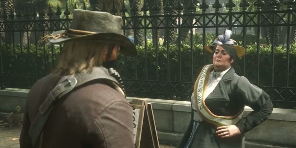 Arthur Morgan stands in front of a feminist