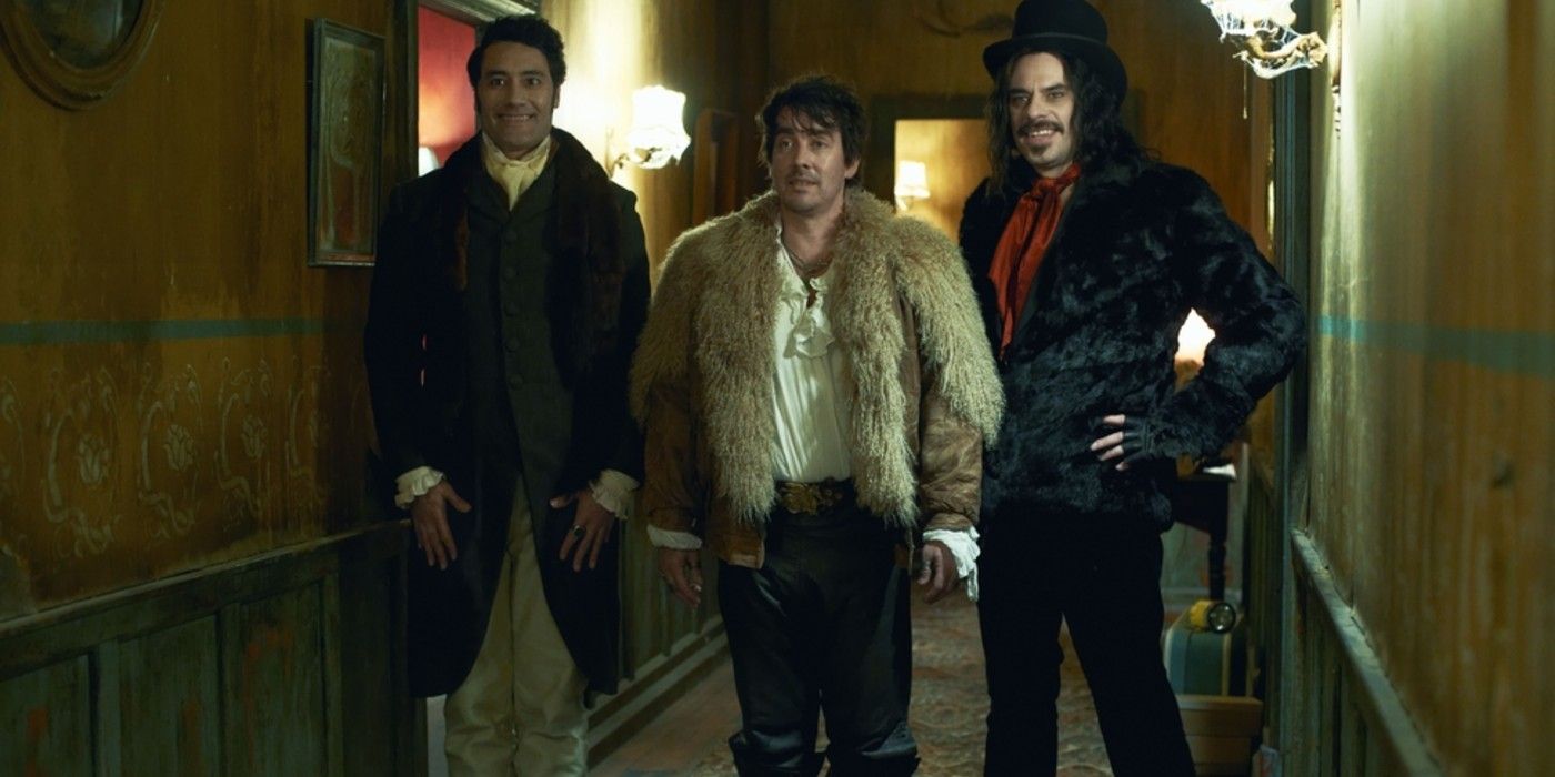 The three main characters from What We Do In The Shadows standing in a hallway