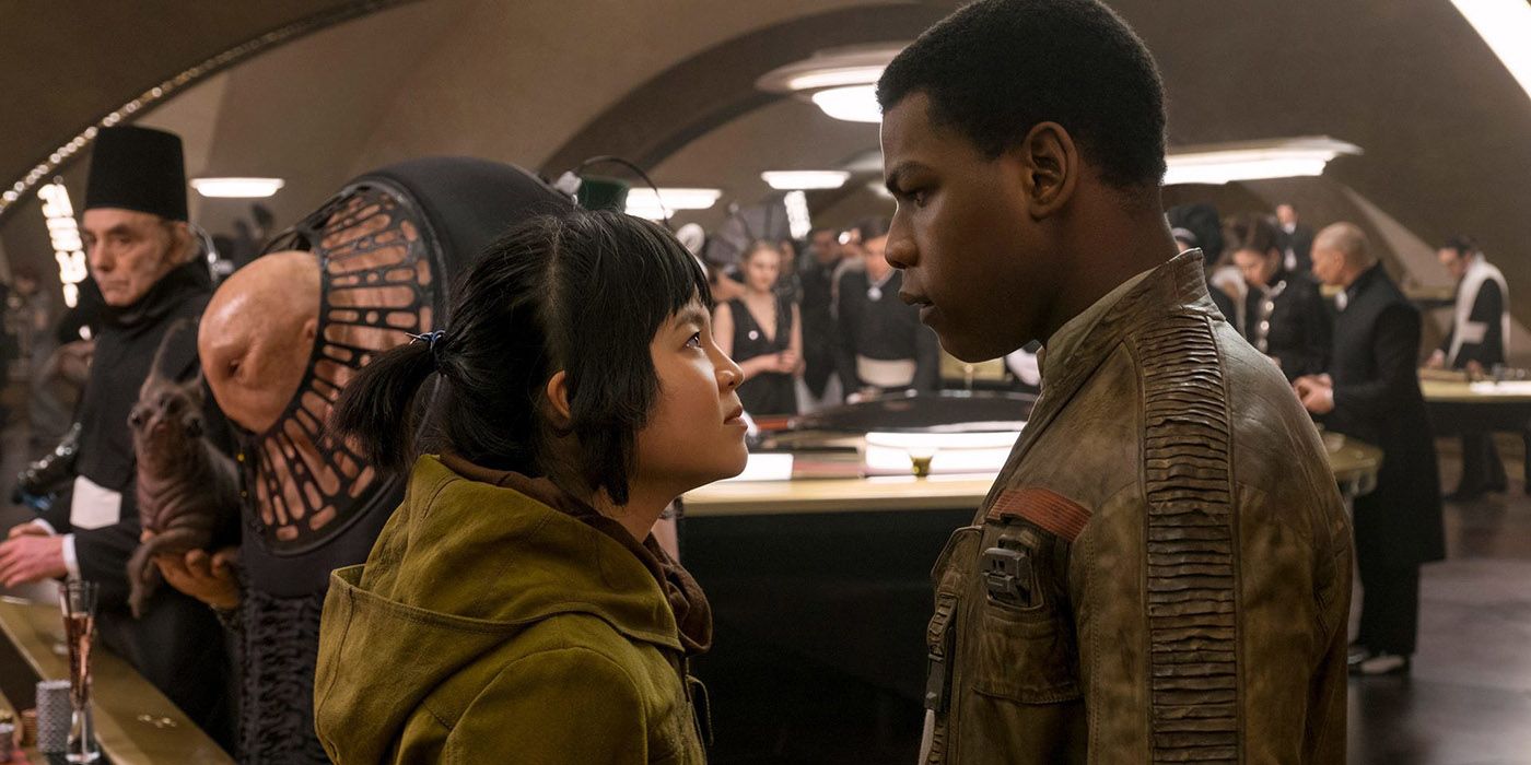 Rose looks angrily at Finn in a casino in Star Wars The Last Jedi.