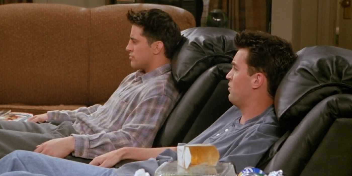 Friends Joey and Chandler sitting in their reclining chairs