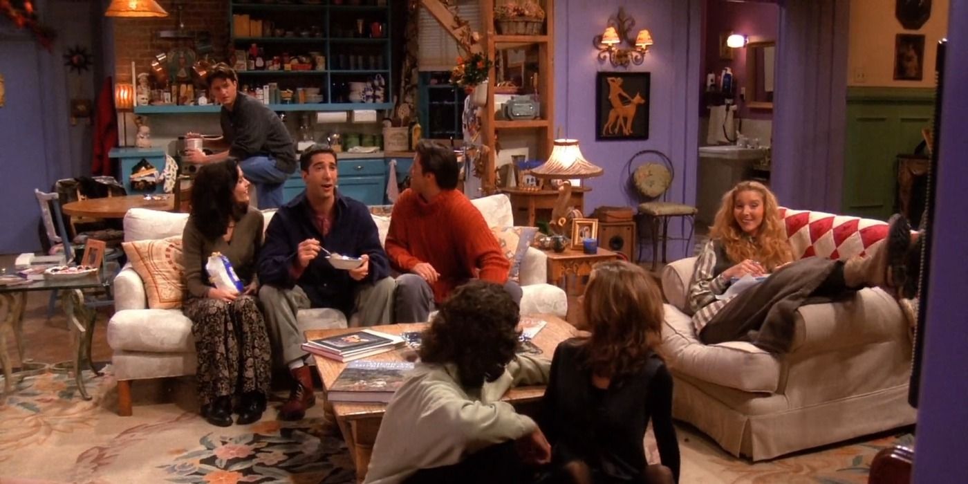 Chandler sits aloof during his mother's interview in Friends.