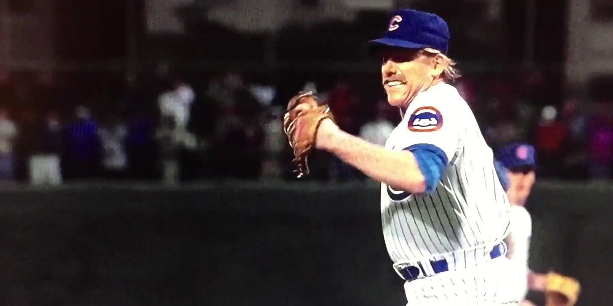 Gary Busey as Chet Steadman pitching in Rookie of the Year