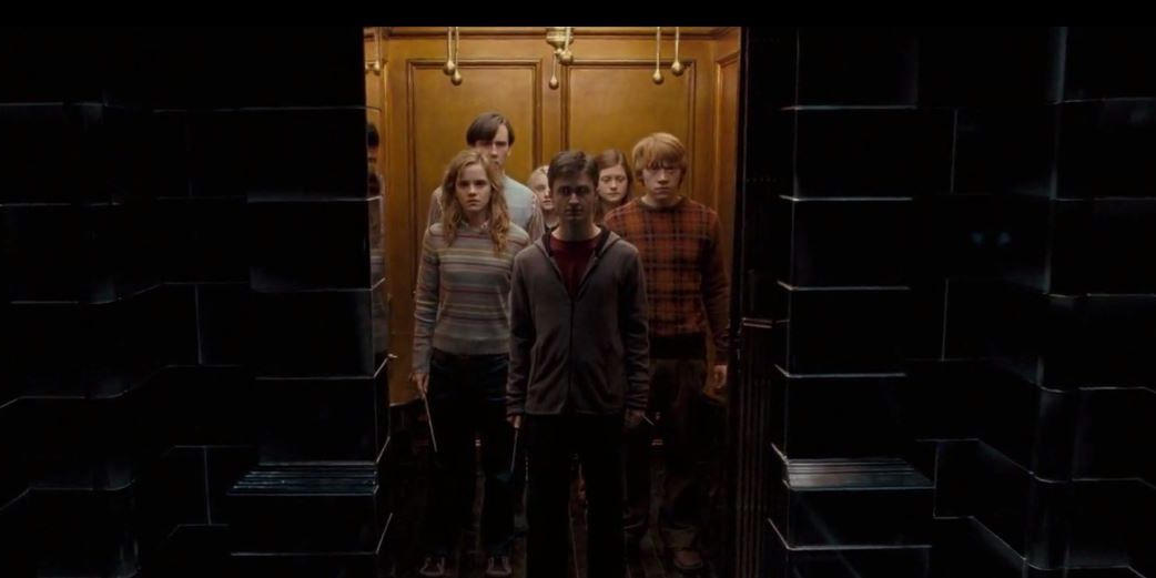 Harry Potter and his friends stand in an elevator in the Department of Mysteries 