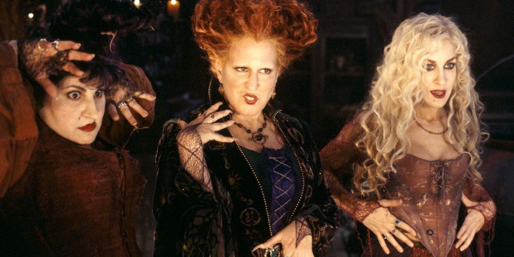 Mary, Sarah and Winfred looking at something off-camera in a scene from Hocus Pocus