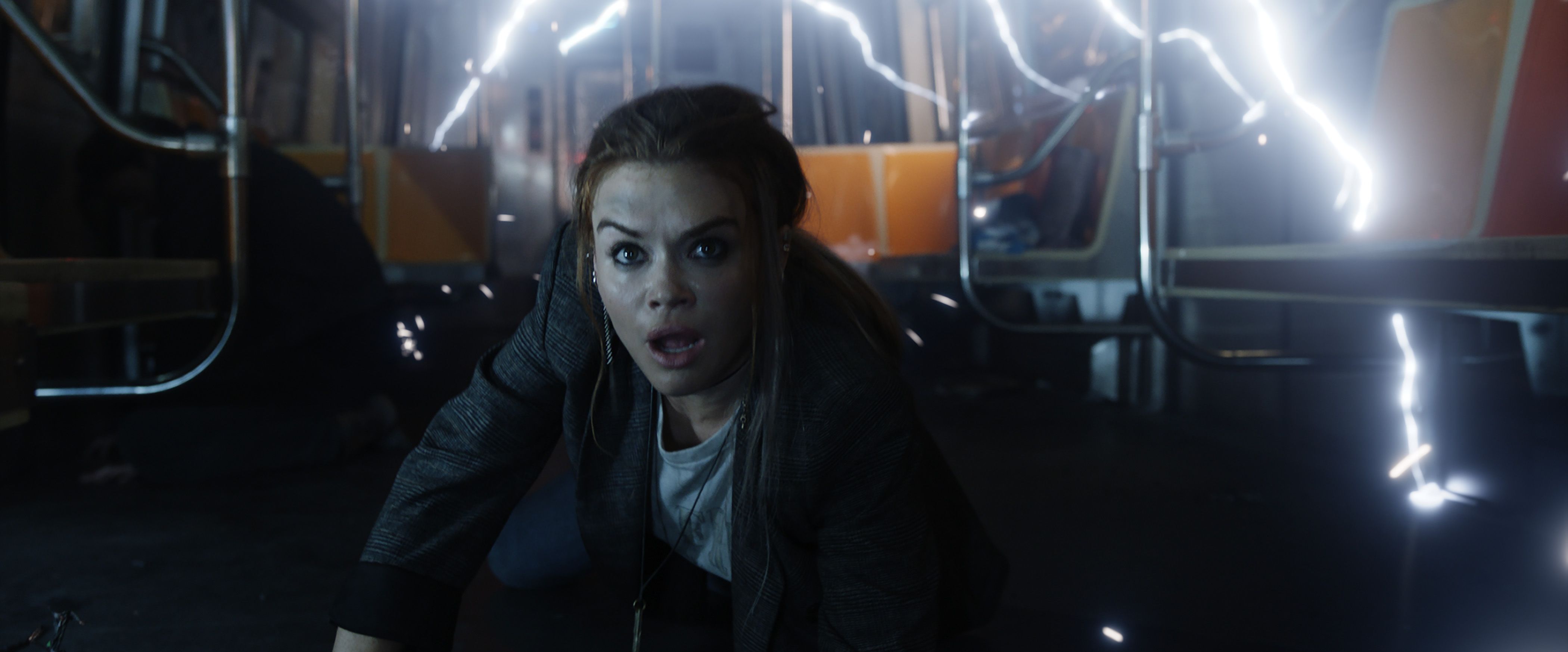 Rachel (Holland Roden) in an electrified subway train in Columbia Pictures' Escape Room: Tournament of Champions.