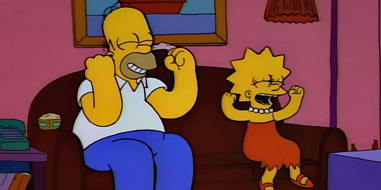 Homer and Lisa watch football in The Simpsons