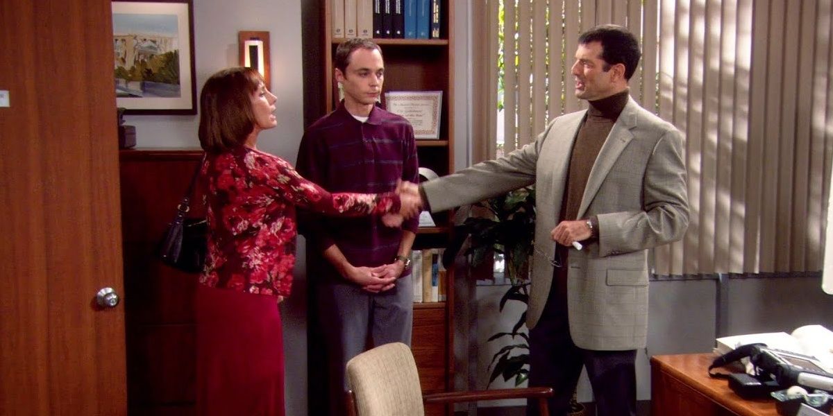Sheldon with the university officials in The Big Bang Theory