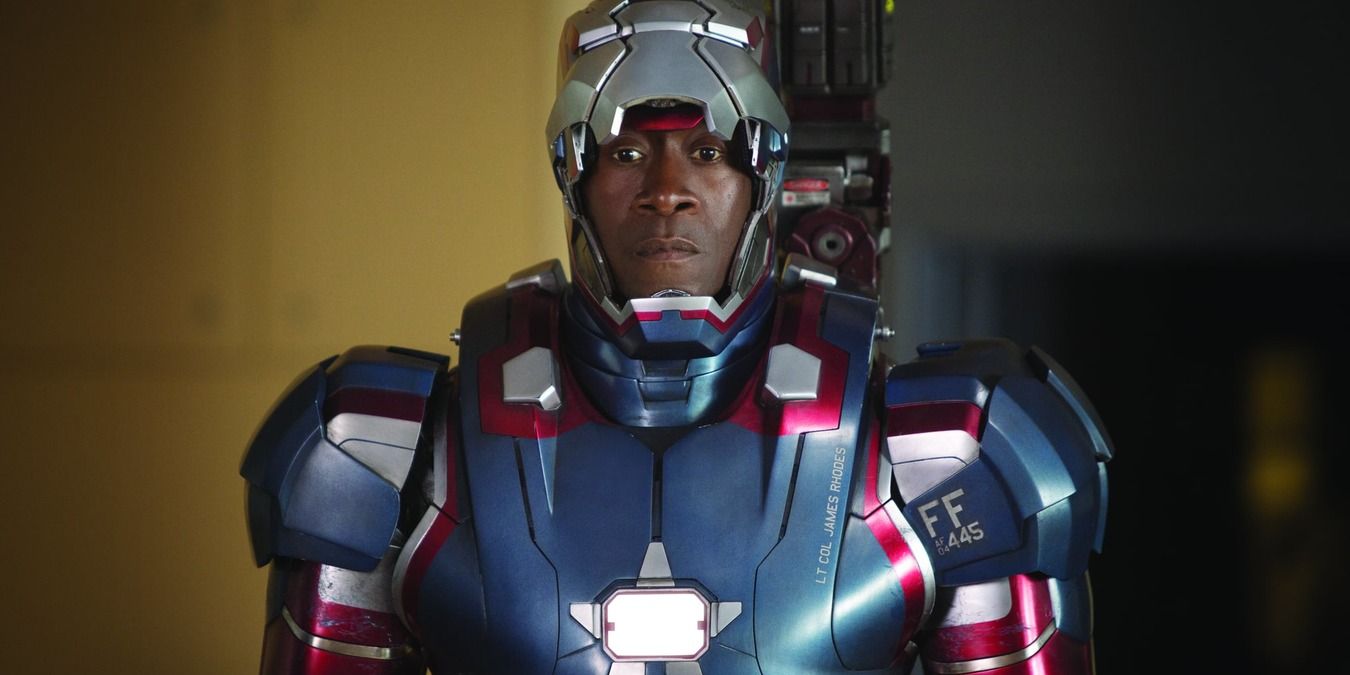James Rhodes standing in War Machine suit with mask up in Iron Man