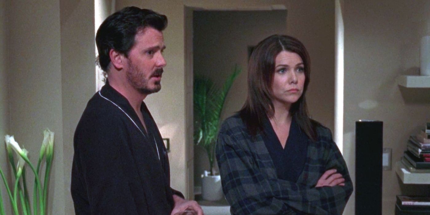 Jason and Lorelai standing in Jason's house on Gilmore Girls