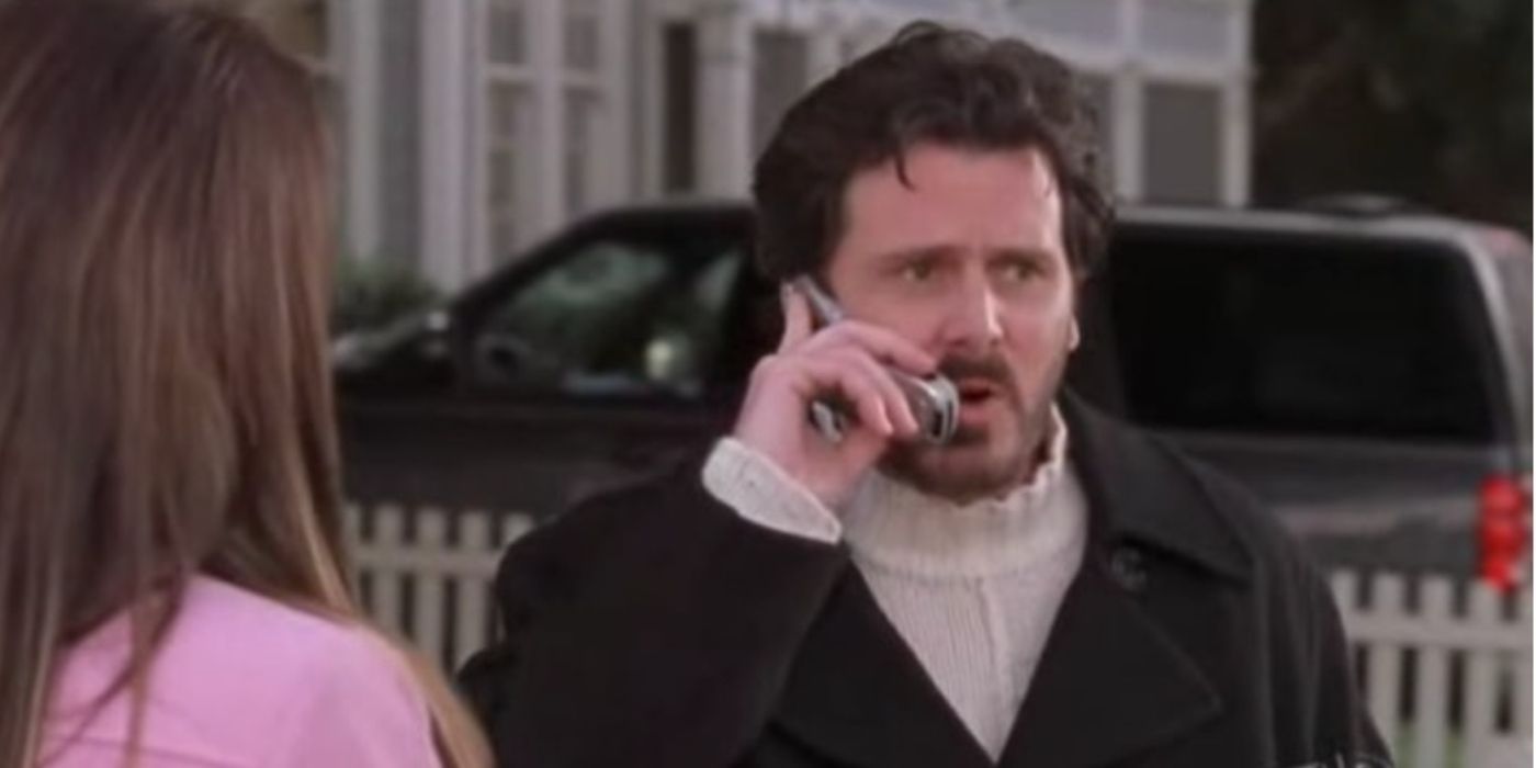 Jason on the phone in front of Lorelai on Gilmore girls