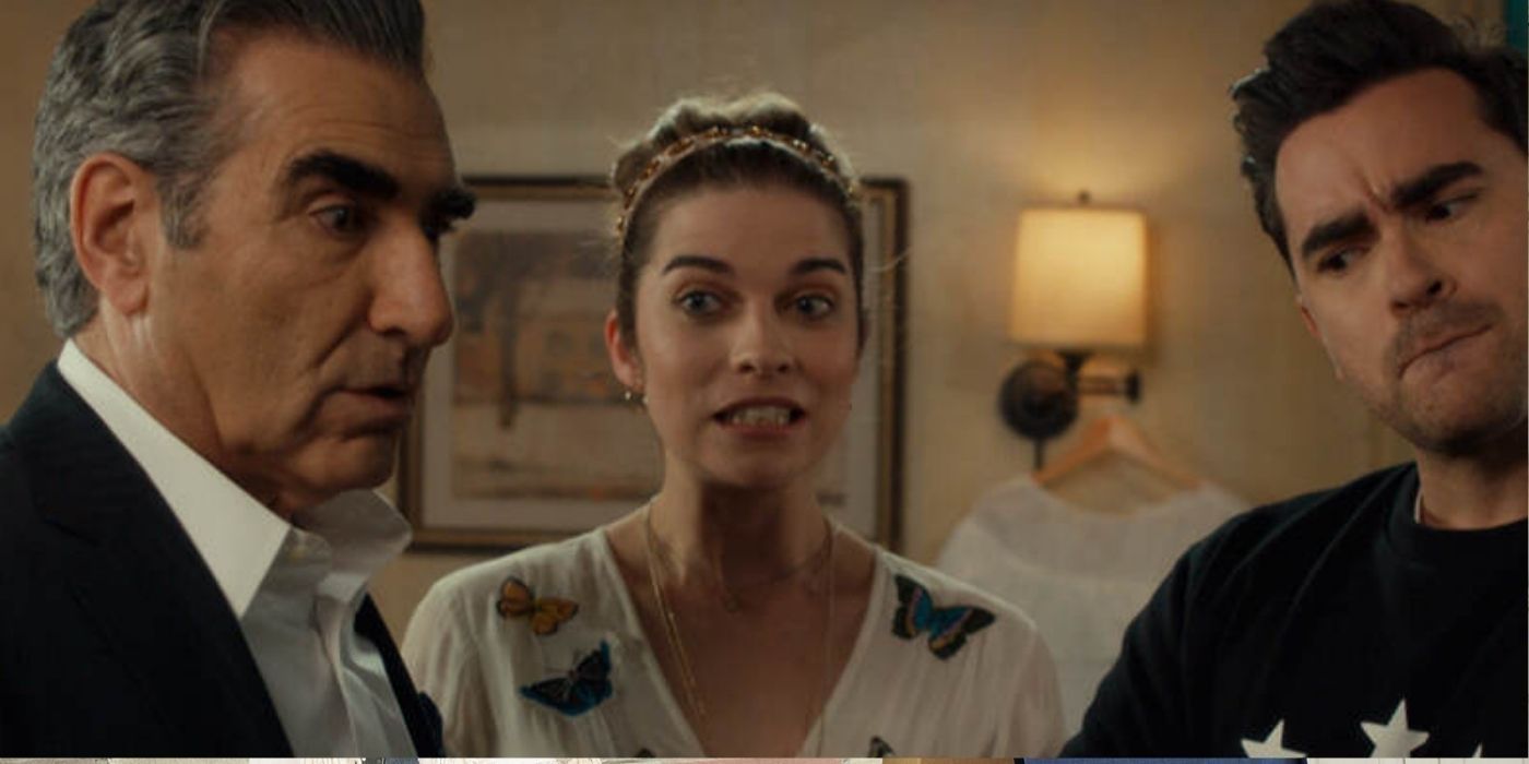 Johnny, Alexis, and David look confused at the motel in Schitt's Creek