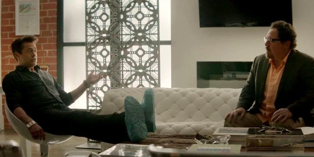 Jon Favreau and Robert Downey Jr. in Chef sitting and talking