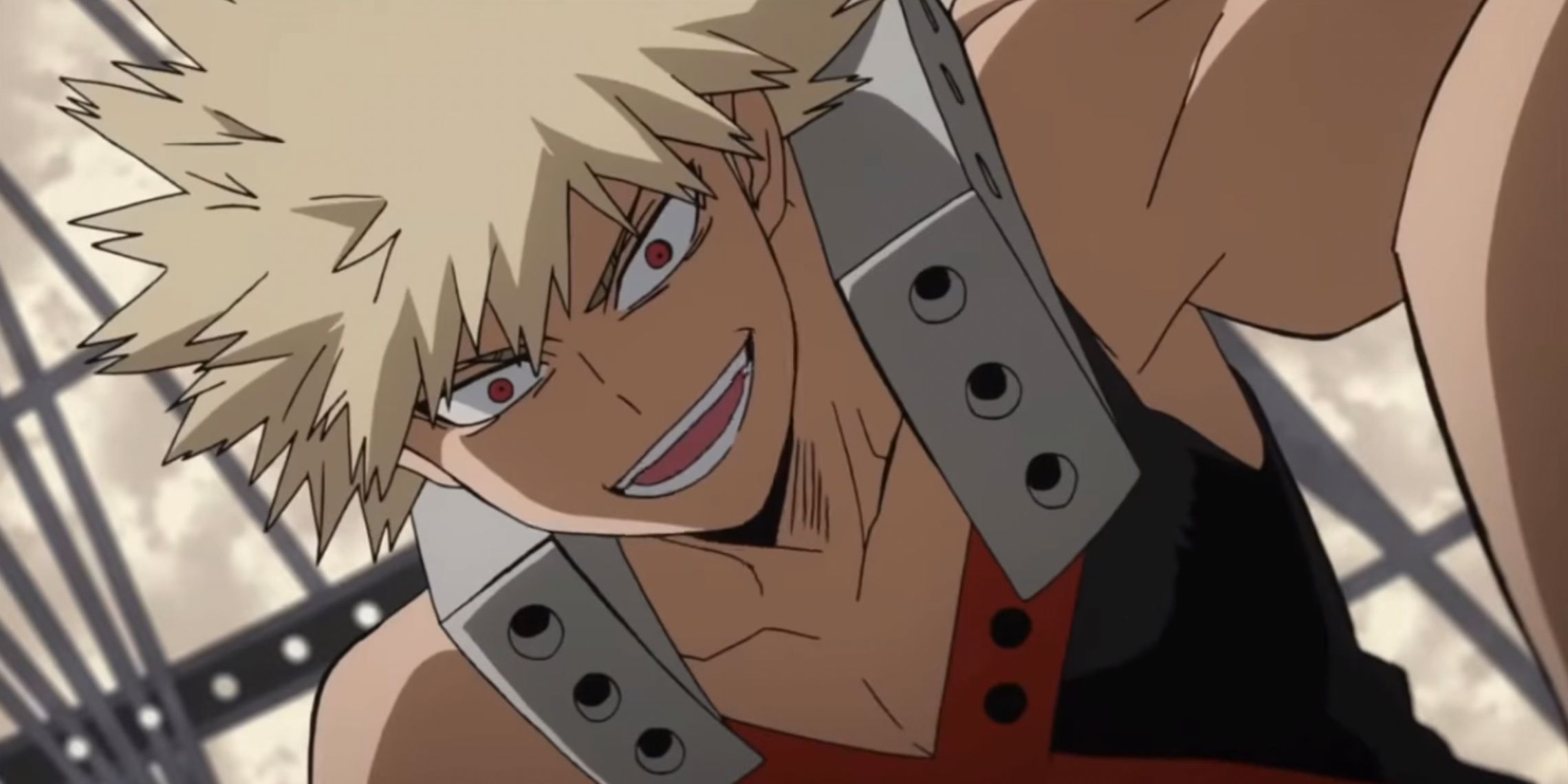 Katsuki Bokugo grins while in a fight in My Hero Academia
