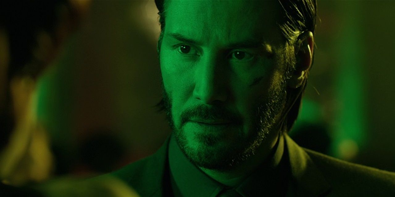Keanu Reeves as John Wick in green lighting