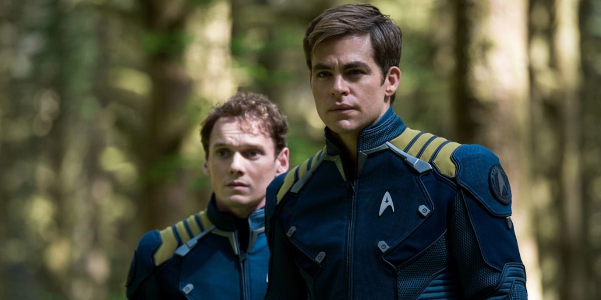 Kirk and Chekov in a forest on Altamid in Star Trek: Beyond.