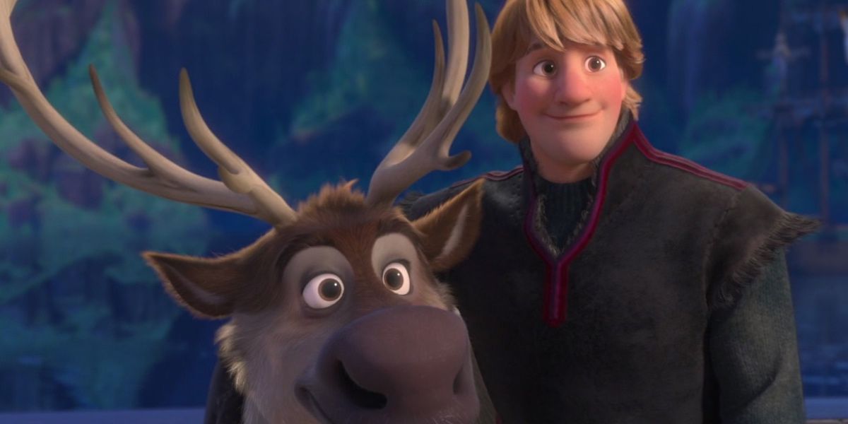 Kristoff standing next to Sven and smiling