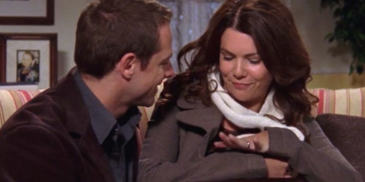 Lorelai and Chris looking at her engagement ring on Gilmore Girls