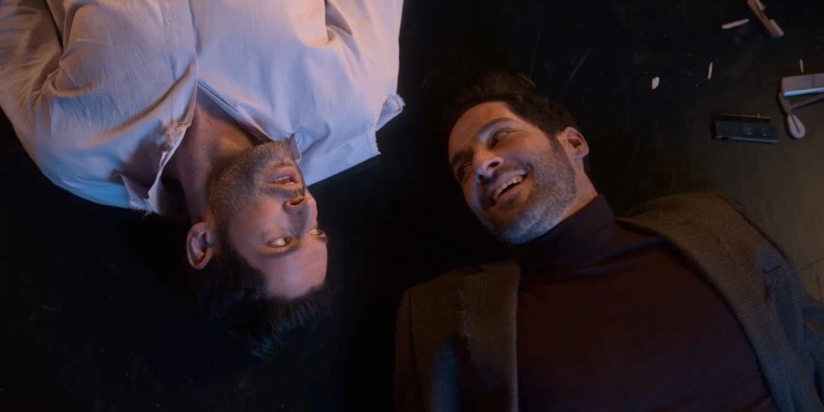 Lucifer and Michael laying on the floor in Lucifer