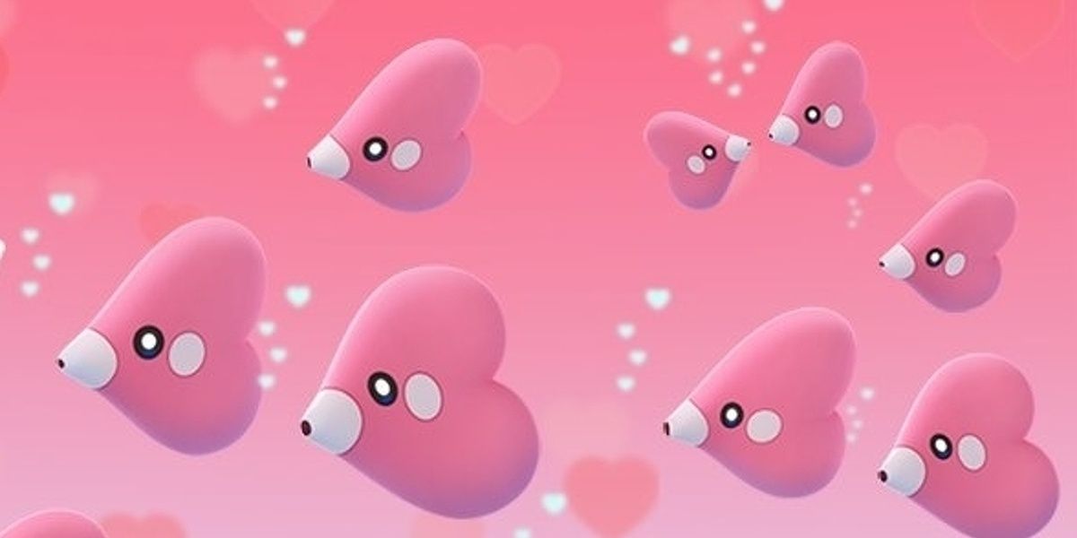 Luvdisc against pink background from Pokemon.