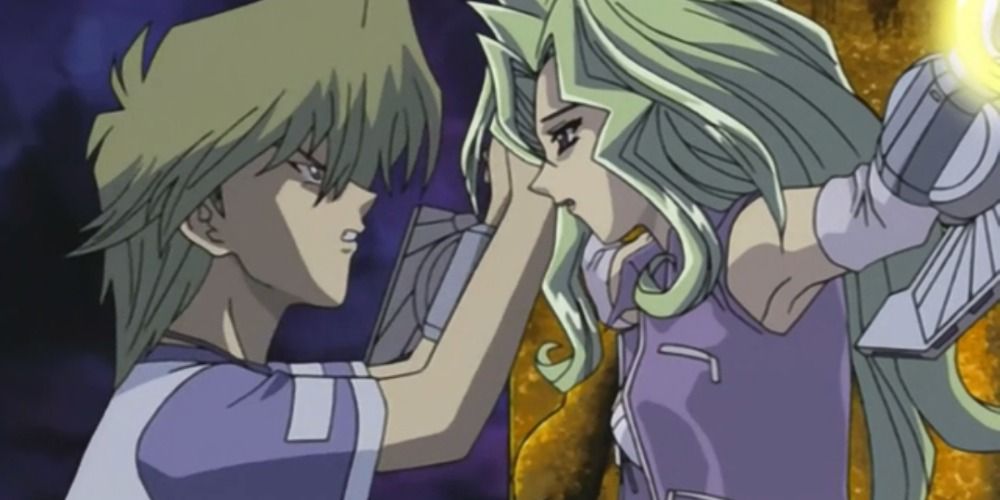 Joey trying to protect Mai during her duel with Marik in Yu-Gi-Oh!