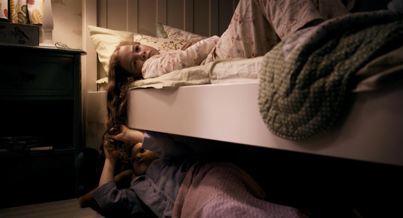 The two main girls featured in the 2013 horror movie Mama.