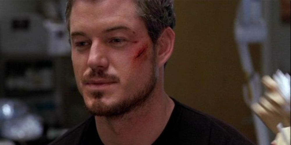 Mark SLoan with a cut on his face
