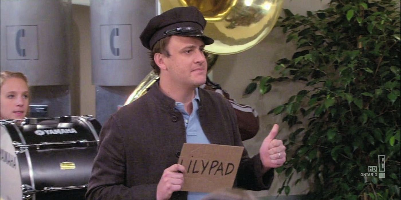 Marshall with a sign and a driver's cap in HIMYM