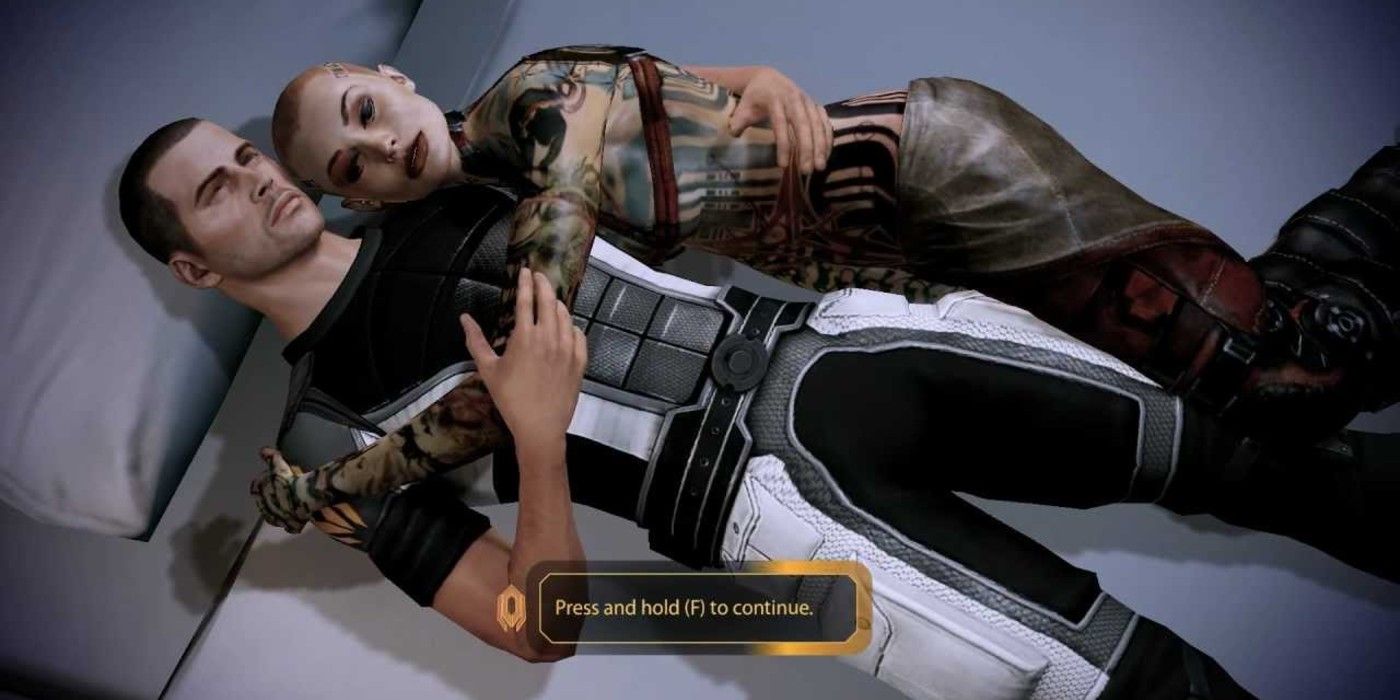 Jack and Shepard cuddle in his quarters in Mass Effect 2