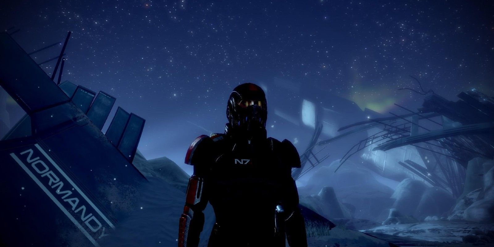 Shepard stands on the Normandy Crash site in Mass Effect 2