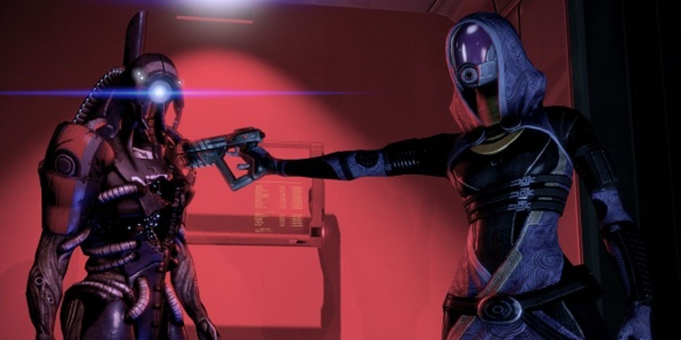 Tali aponta uma arma para Legion em Mass Effect 2