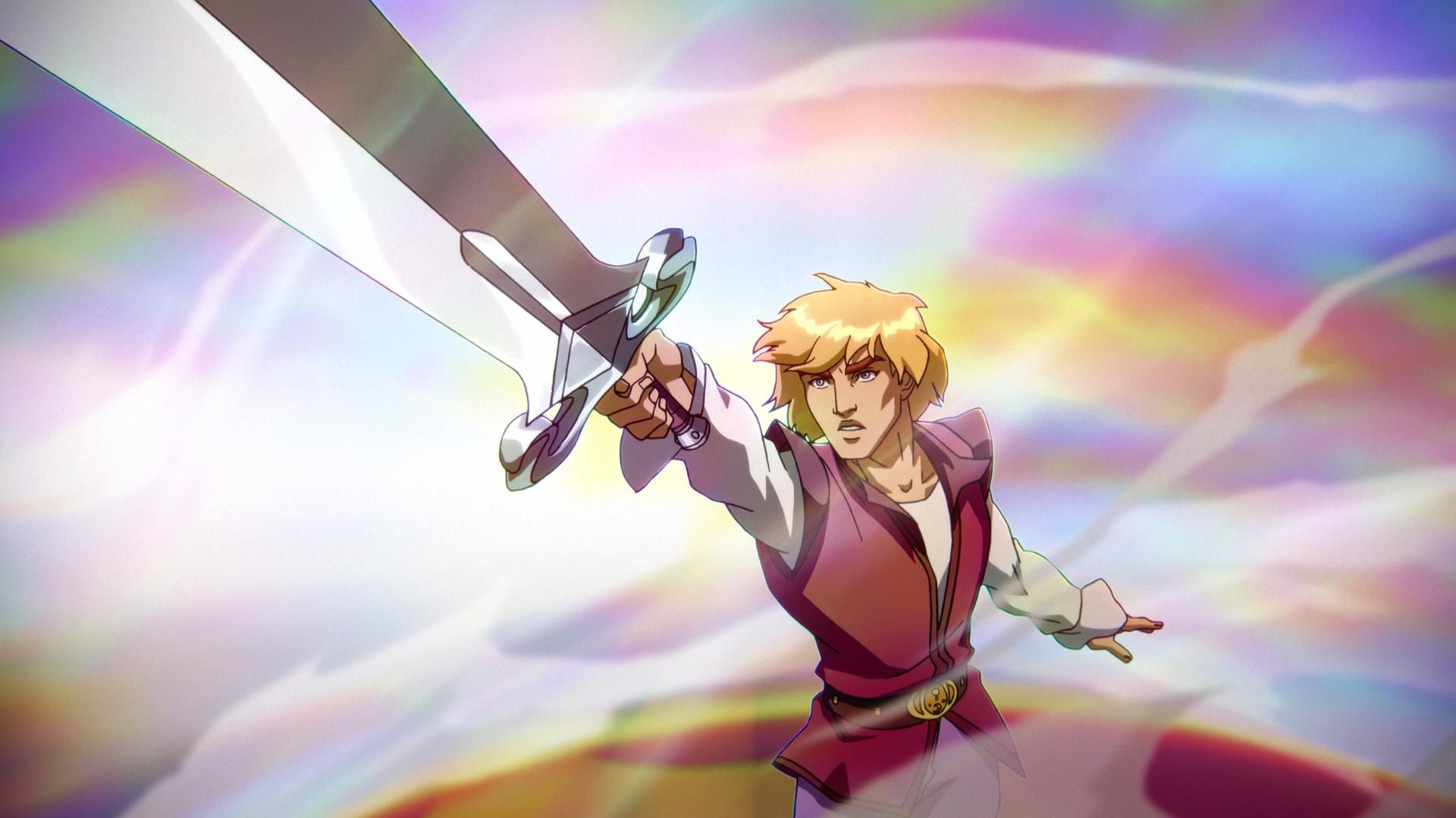 In a CG animated still from Masters of the Universe: Revelation, Prince Adam, a young light-skinned male with light-colored eyes and blonde hair, stands encircled in a multi-colored fog, silver sword raised with his right arm. He wears a white long sleeve tunic, a red vest and a brown belt with a golden belt buckle cinching his waist.