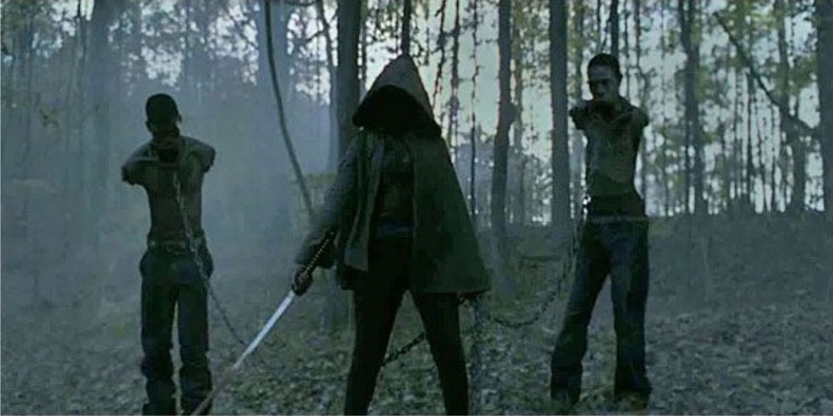 Michonne saves a survivor from the zombies
