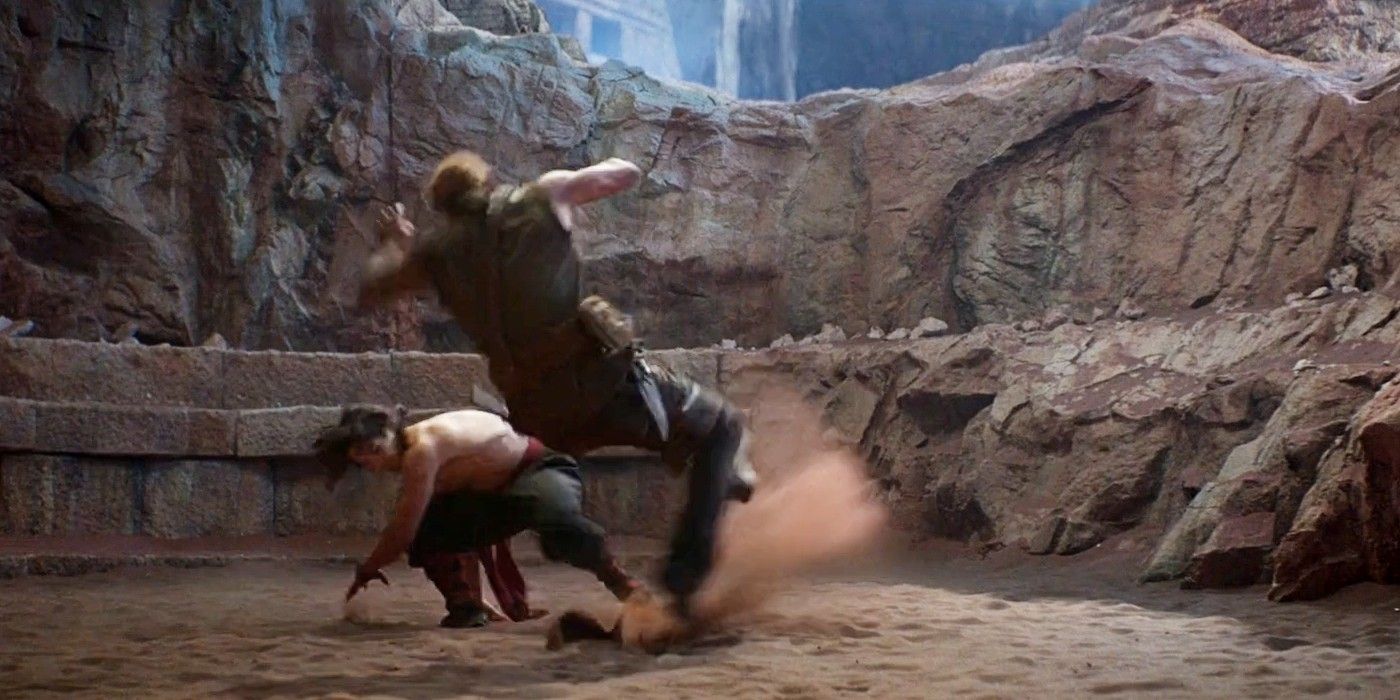 Liu Kang pulls the Leg Sweep on Kano in Mortal Kombat
