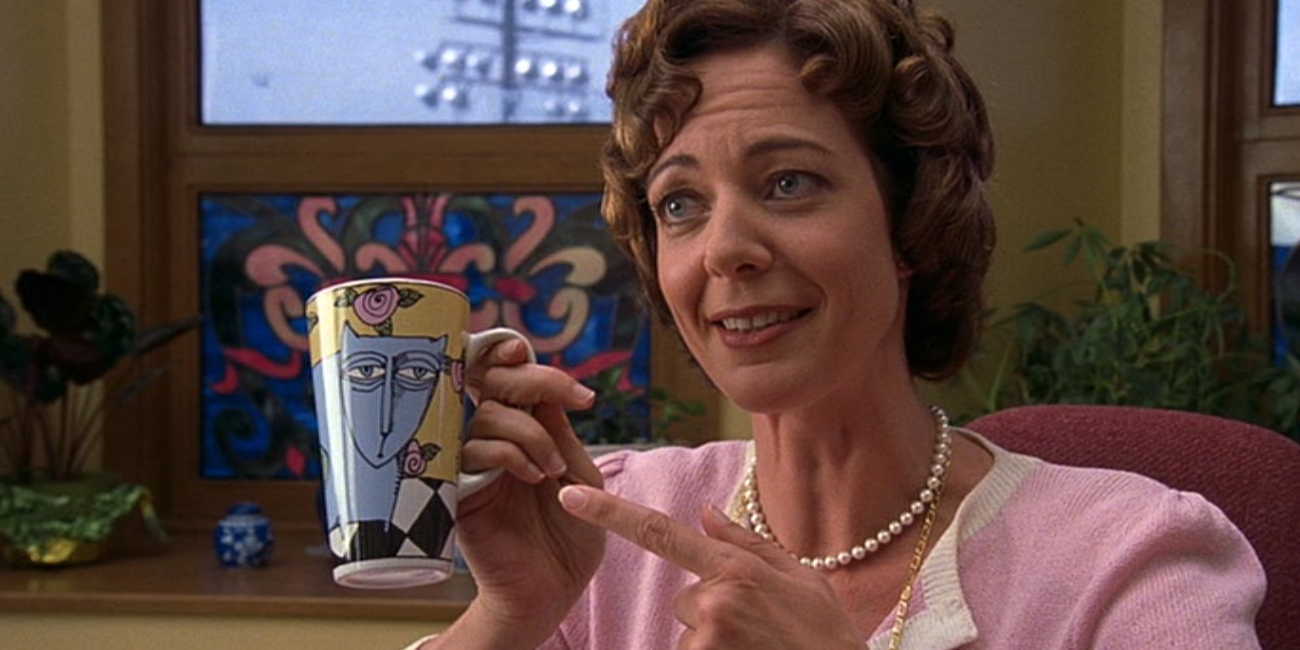 Ms. Perky with her cat mug in 10 hings I Hate About You