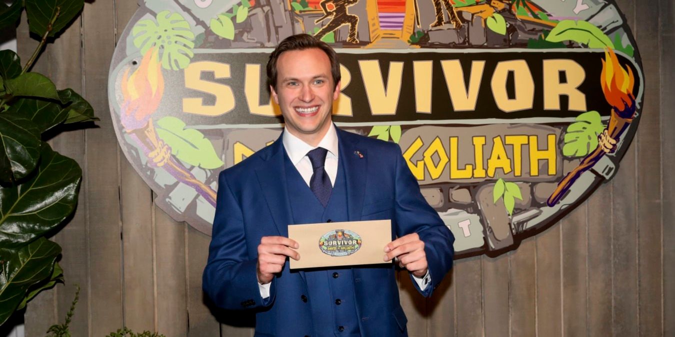 Nick Wilson with cheque after final tribal council
