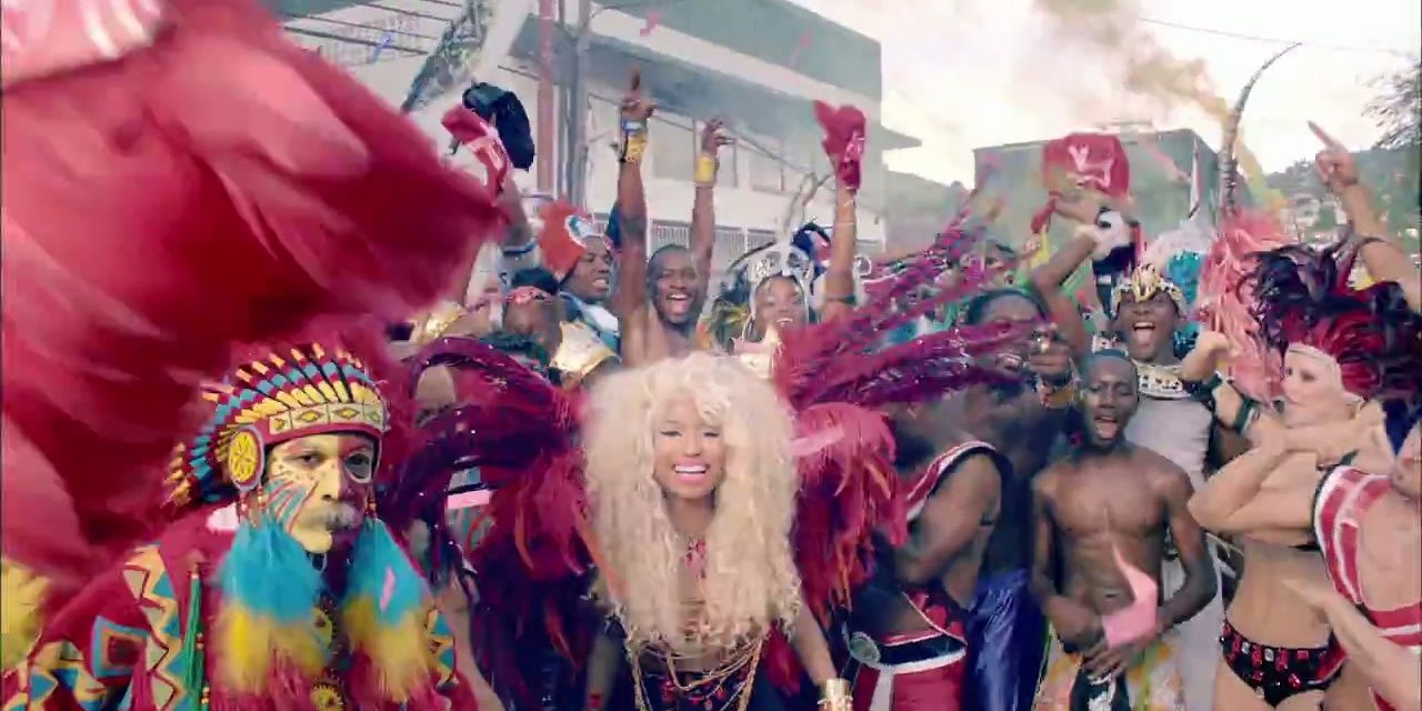 Nicki Minaj dancing at the Trinidad and Tobago carnival in the &quot;Pound The Alarm&quot; music video