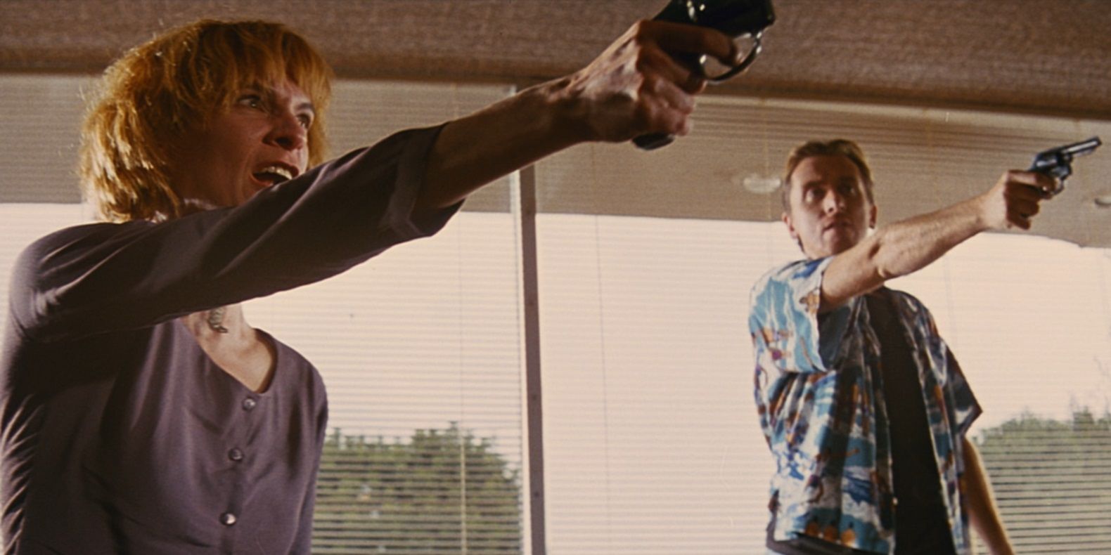Pumpkin and Honey Bunny stick up a diner in Pulp Fiction