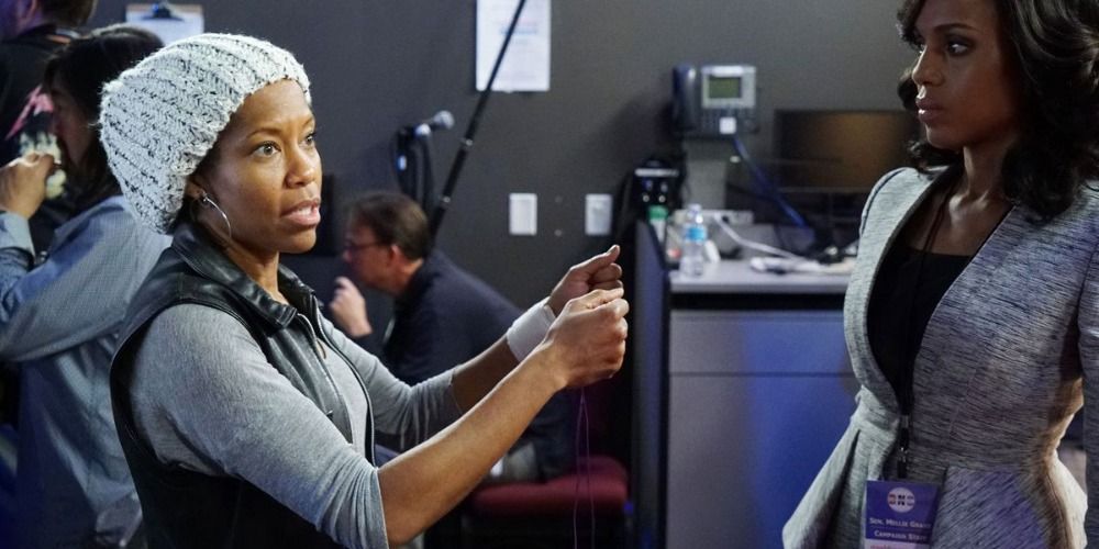 Regina King directing on the set of Scandal with Kerry Washington nearby