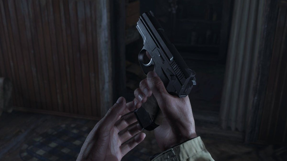 Resident Evil Village Ethan Loading A Pistol