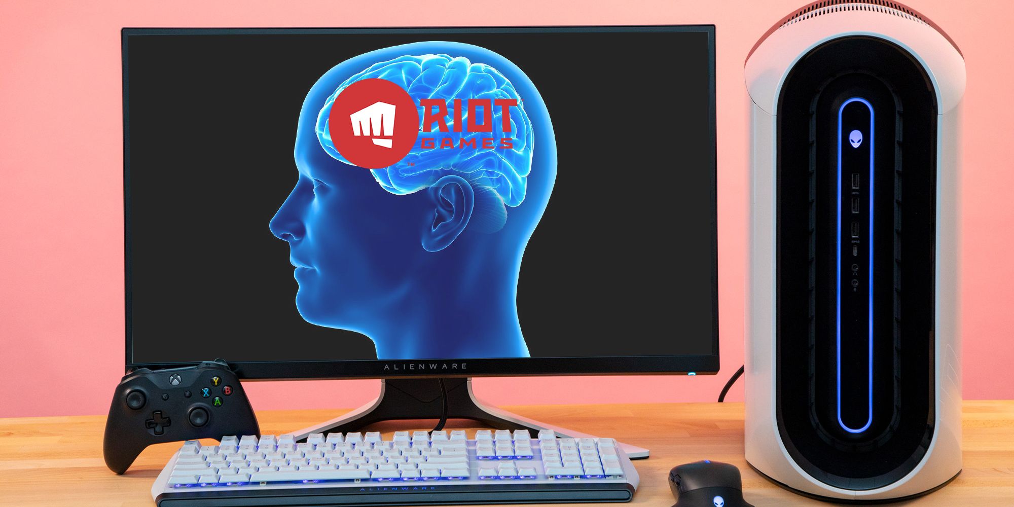 Computer with a human brain and the Riot logo inside it.